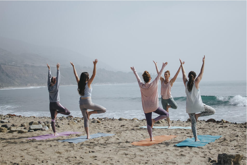 yoga class on the beach