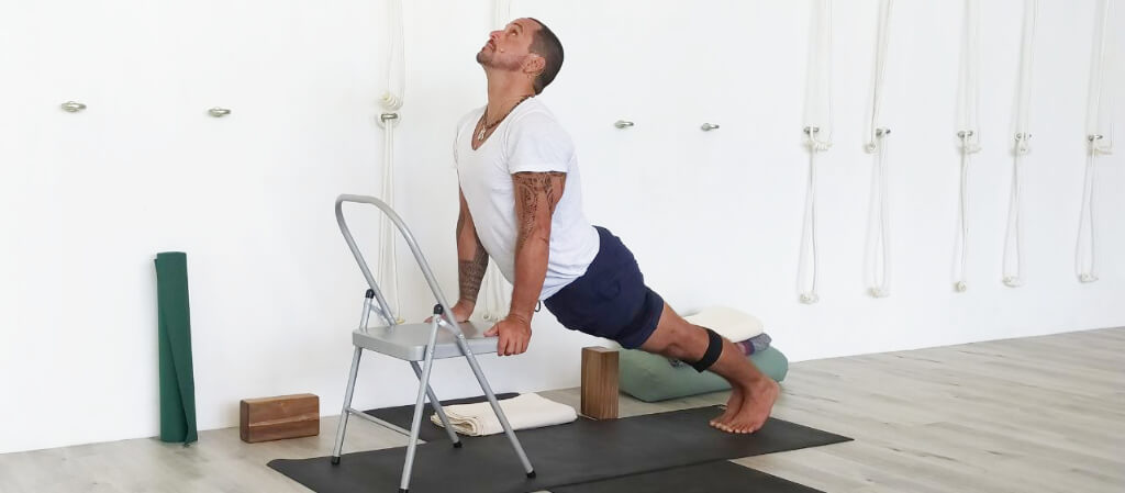 Iyengar Yoga Teacher Juan Carlos demonstrate a Upward Dog Pose