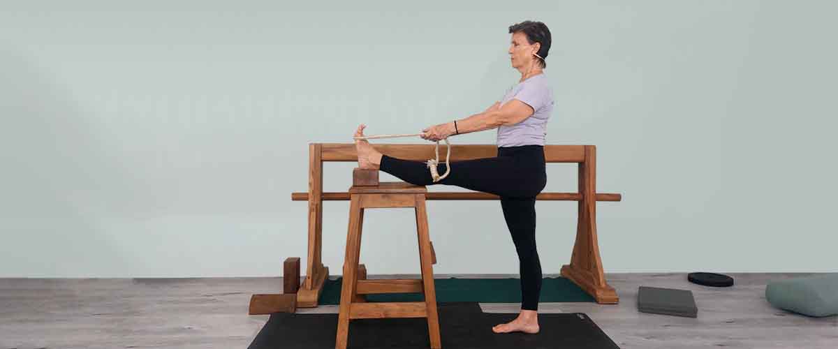 Senior Iyengar Yoga Teacher Kathy Cook demonstrate a Yoga pose