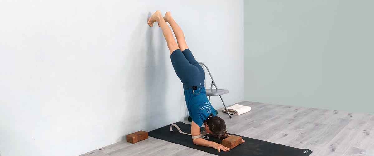 Senior Iyengar Yoga Teacher Kathy Cook demonstrate a Yoga pose