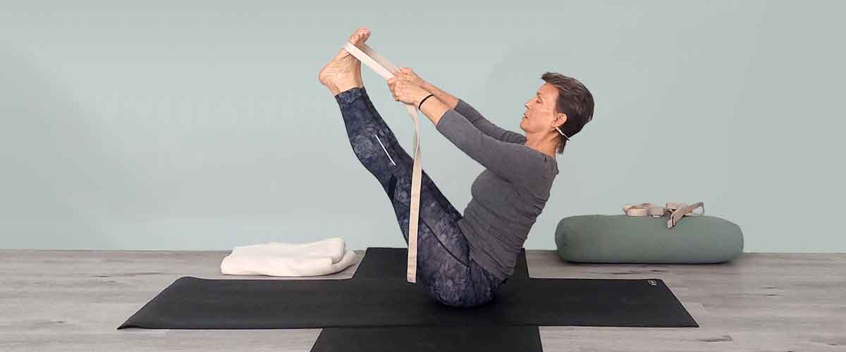 Senior Iyengar Yoga Teacher Kathy Cook demonstrate a Yoga pose