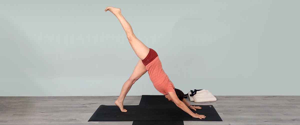 Senior Iyengar Yoga Teacher Kathy Cook demonstrate a Yoga pose