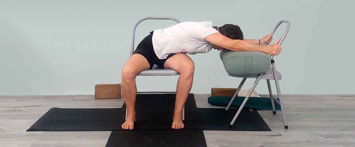 Senior Iyengar Yoga Teacher Kathy Cook demonstrate a Yoga pose