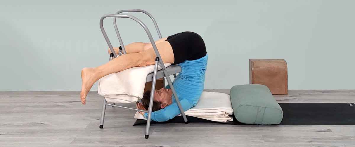 Senior Iyengar Yoga Teacher Kathy Cook demonstrate a Yoga pose