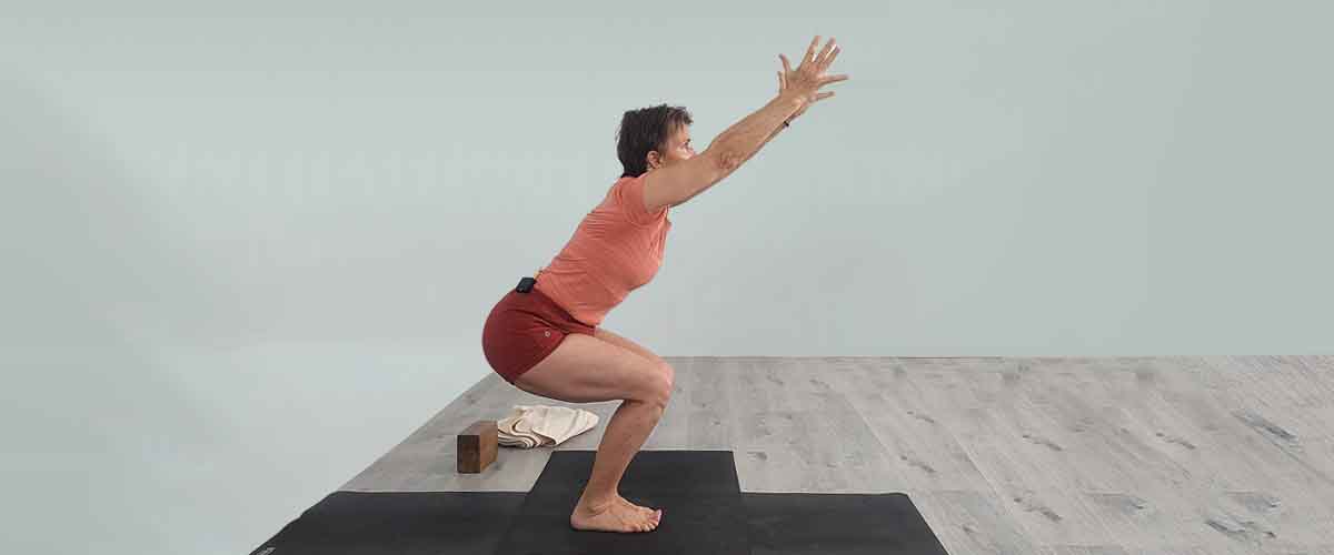 Senior Iyengar Yoga Teacher Kathy Cook demonstrate a Yoga pose