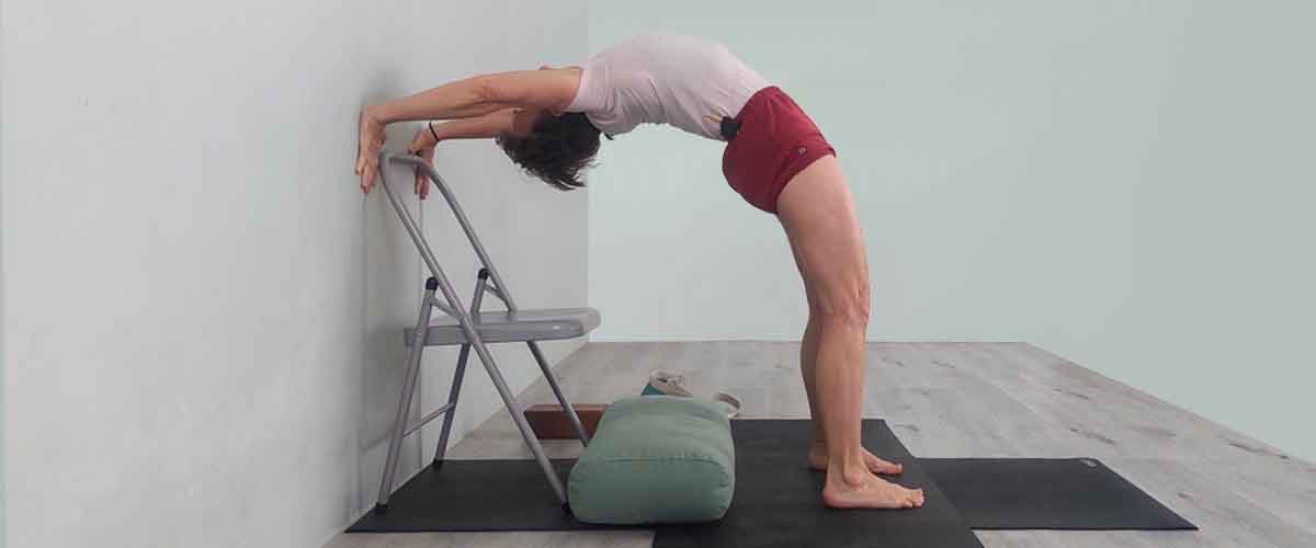 Senior Iyengar Yoga Teacher Kathy Cook demonstrate a Yoga pose