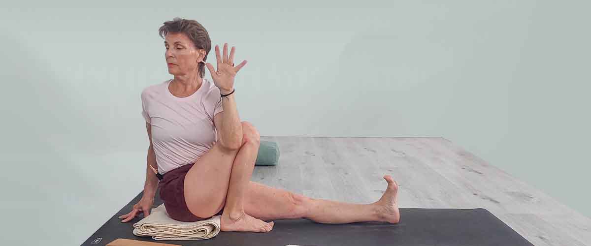 Senior Iyengar Yoga Teacher Kathy Cook demonstrate a Yoga pose