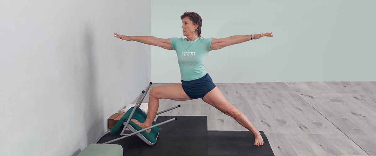 Senior Iyengar Yoga Teacher Kathy Cook demonstrate a Yoga pose