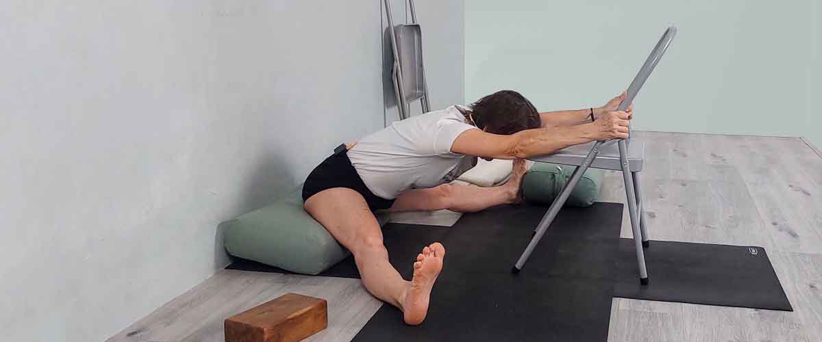 Senior Iyengar Yoga Teacher Kathy Cook demonstrate a Yoga pose