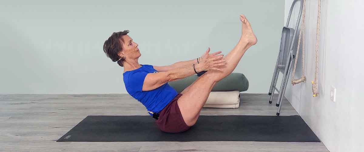 Senior Iyengar Yoga Teacher Kathy Cook demonstrate a Yoga pose