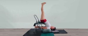 Senior Iyengar Yoga Teacher Kathy Cook demonstrate a Yoga pose