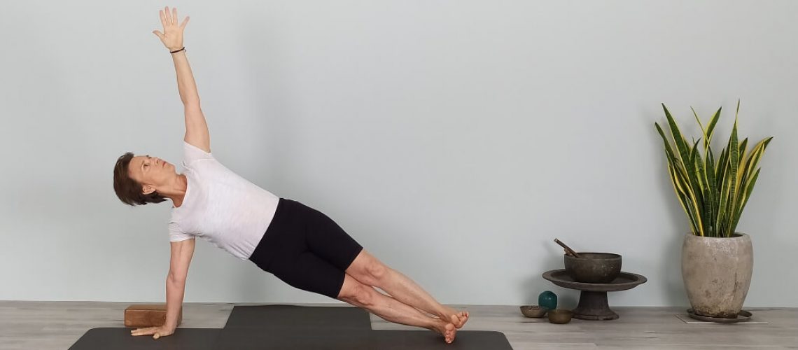 senior iyengar teacher kathy cook teaching an intermediate yoga class