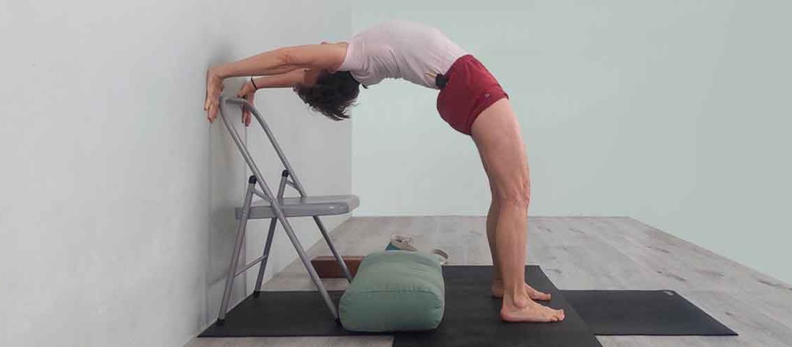 Senior Iyengar Yoga Teacher Kathy Cook demonstrate a Yoga pose