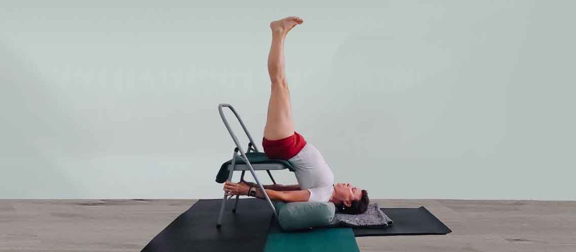 Senior Iyengar Yoga Teacher Kathy Cook demonstrate a Yoga pose