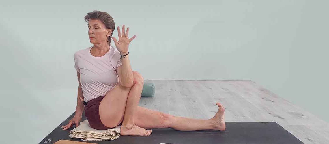 Senior Iyengar Yoga Teacher Kathy Cook demonstrate a Yoga pose