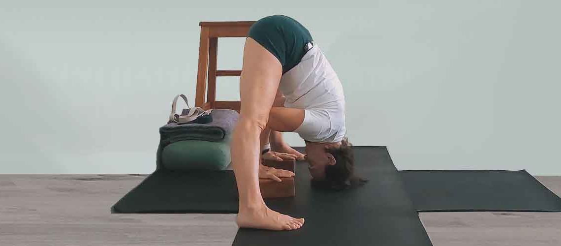 Senior Iyengar Yoga Teacher Kathy Cook demonstrate a Yoga pose