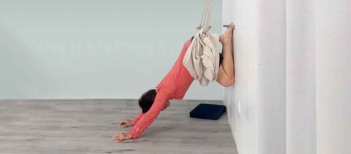 Senior Iyengar Yoga Teacher Kathy Cook demonstrate a Yoga pose