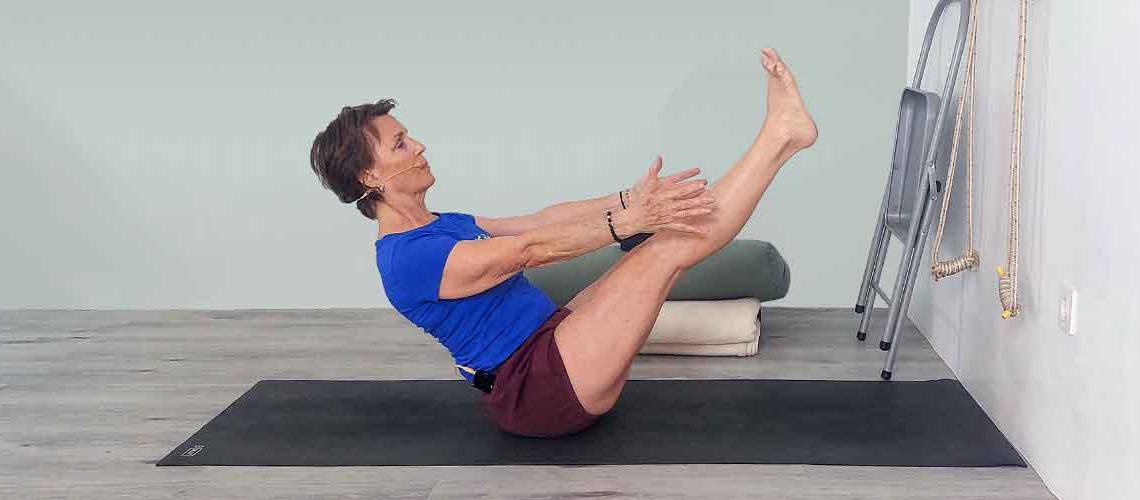 Senior Iyengar Yoga Teacher Kathy Cook demonstrate a Yoga pose