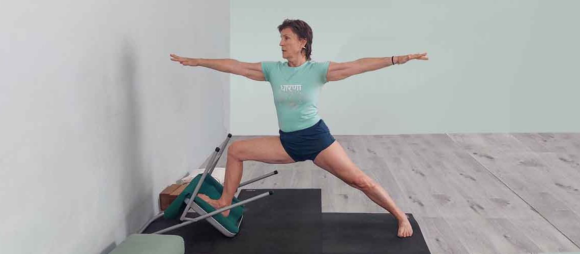 Senior Iyengar Yoga Teacher Kathy Cook demonstrate a Yoga pose