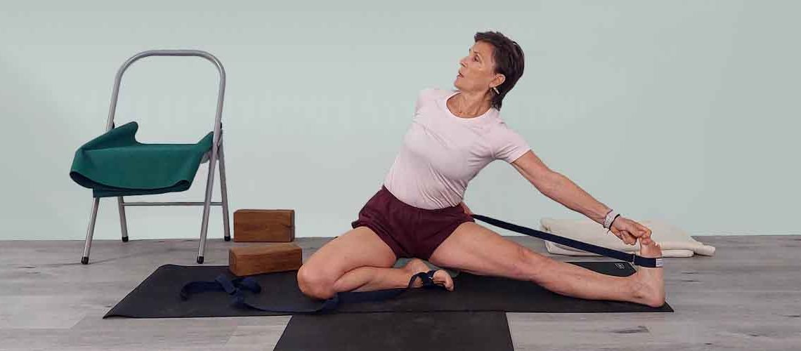 Senior Iyengar Yoga Teacher Kathy Cook demonstrate a Yoga pose