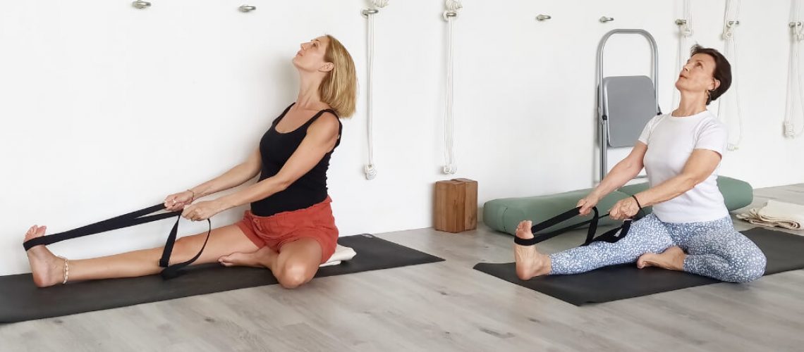 Senior Iyengar Yoga Teacher Kathy Cook demonstrate a Head to Knee Preparation Pose