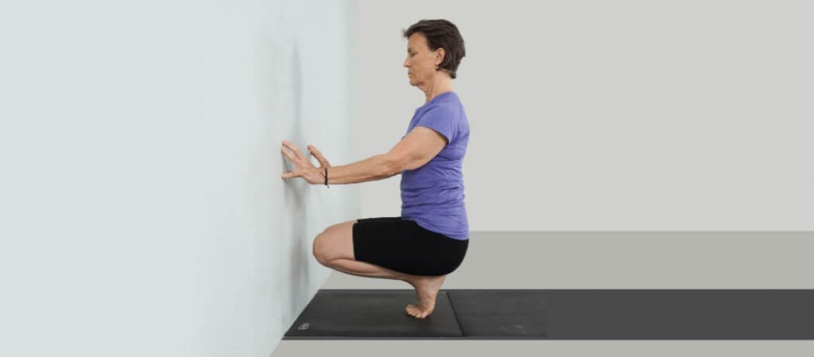 Senior Iyengar Yoga Teacher Kathy Cook demonstrate a Toe Balance Pose