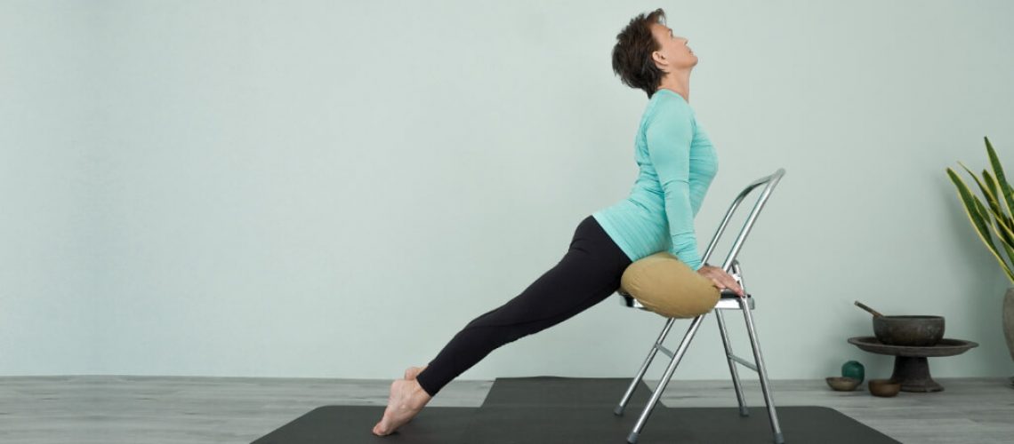 senior iyengar teacher kathy cook demonstrating back stretch